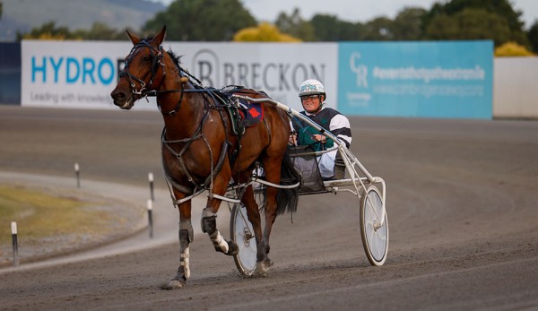 Hibell claims first training win