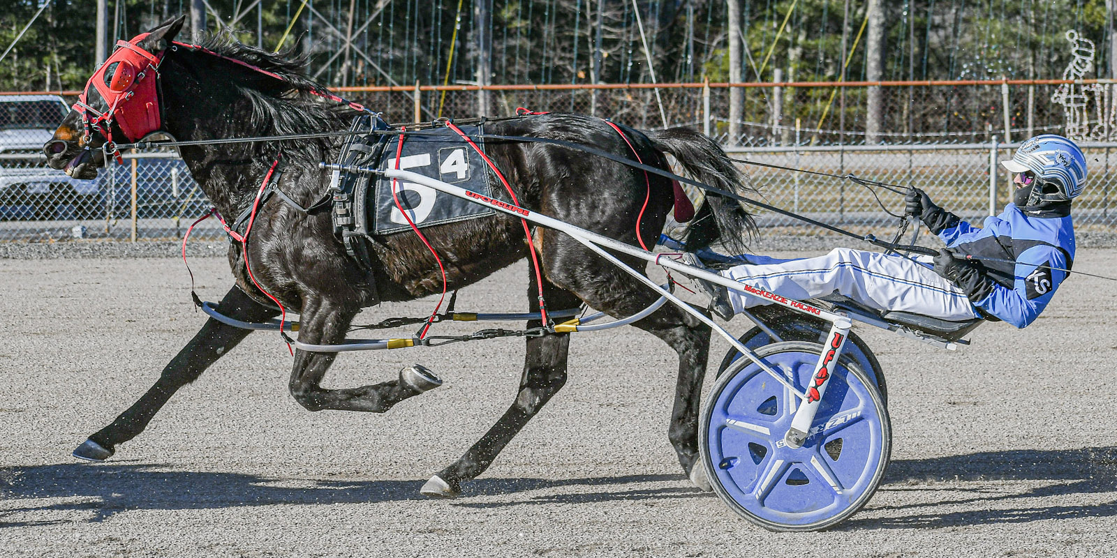 Leadingreinsman Kevin Switzer Jr. guided Juneparker to a thrilling victory in the $10,00final feature at Cumberland